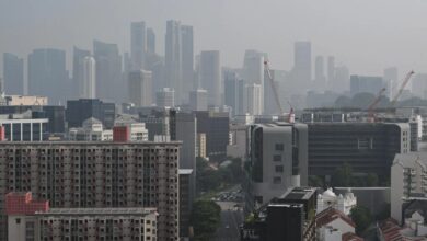 Singapore air quality improves slightly but remains in unhealthy range
