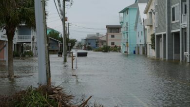 Father and son killed in Peru as floods and mudslides displace thousands in southern regions